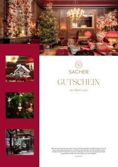 Festlicher Hotel Sacher Gutschein (999 EUR) mit Weihnachtsbaum und elegantem Interieur.